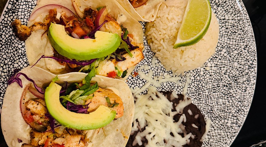 Caló Kitchen + Tequila signature dishes Quesadilla Chicken FajitasShort Rib Enchiladas
